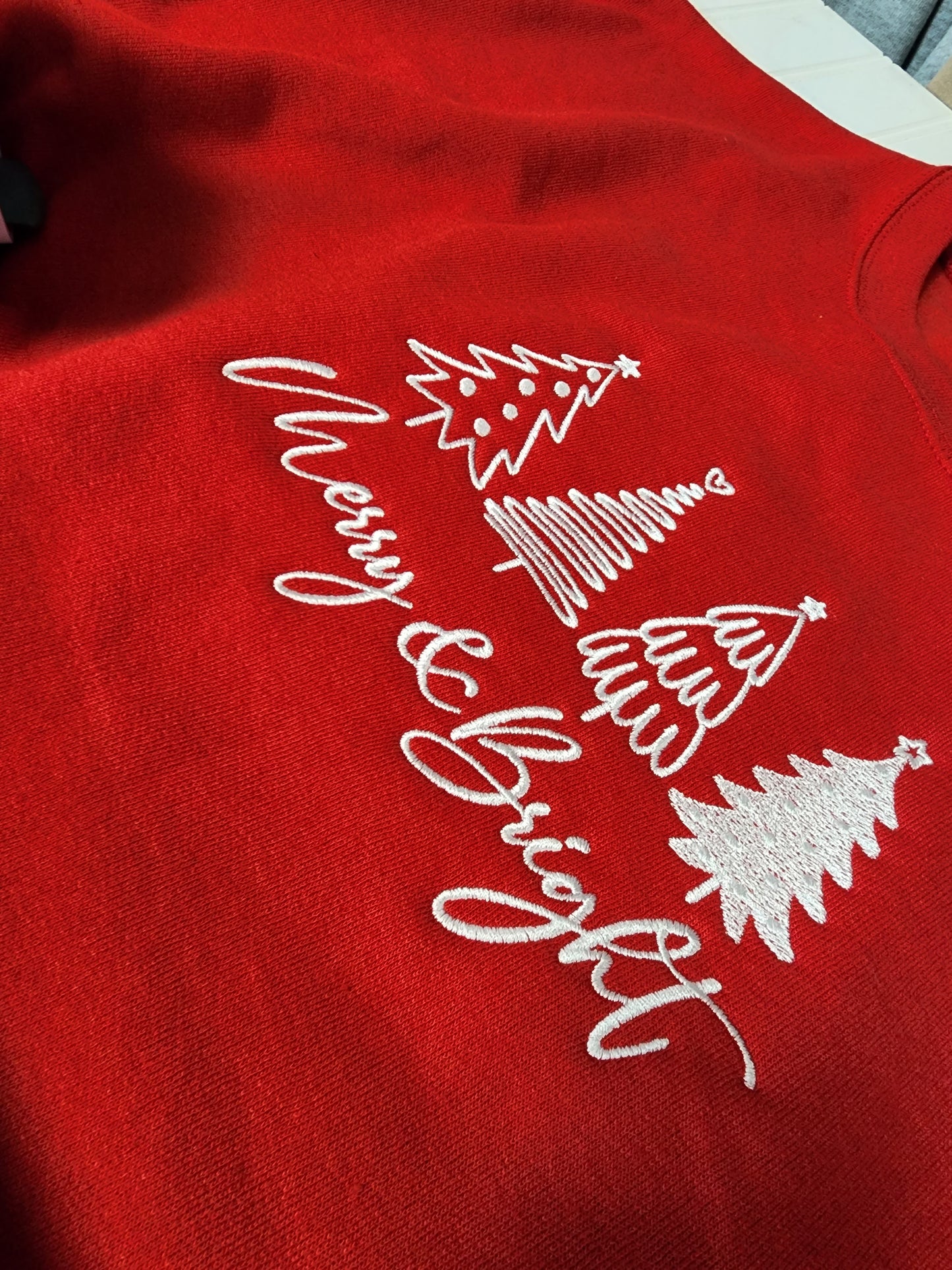 Merry & Bright Embroidered crewneck.