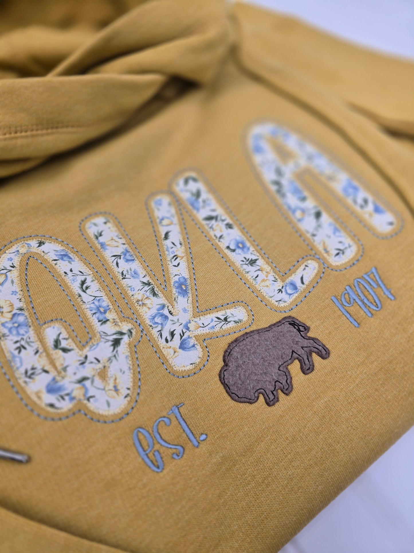 OKLA embroidered funnel neck hoodie